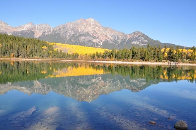 3-Day Authentic Jasper National Park Packaged Tour - Day 3: Pyramid Lake to Peyto, Emerald, and the Natural Bridge before Calgary