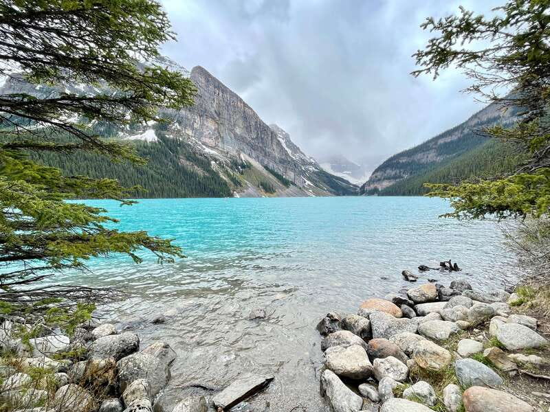 From Calgary: Banff & Yoho National Parks Private Day Tour - Emerald Lake in Yoho: calmer water, deeper forest feel