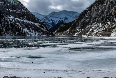 Grassi Lake and Grotto Canyon Hiking Calgary/Canmore/Banff - Grotto Canyon ice walk: limestone cliffs, pictographs, and winter footing