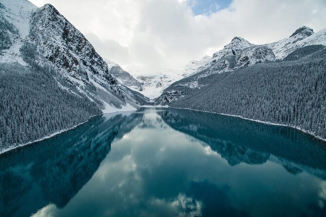 Moraine Lake, Louise Emerald Lake, and Peyto Lake all in day tour - On the Road: Cascade Mountain, Castle Mountain, and Mt. Rundle Views